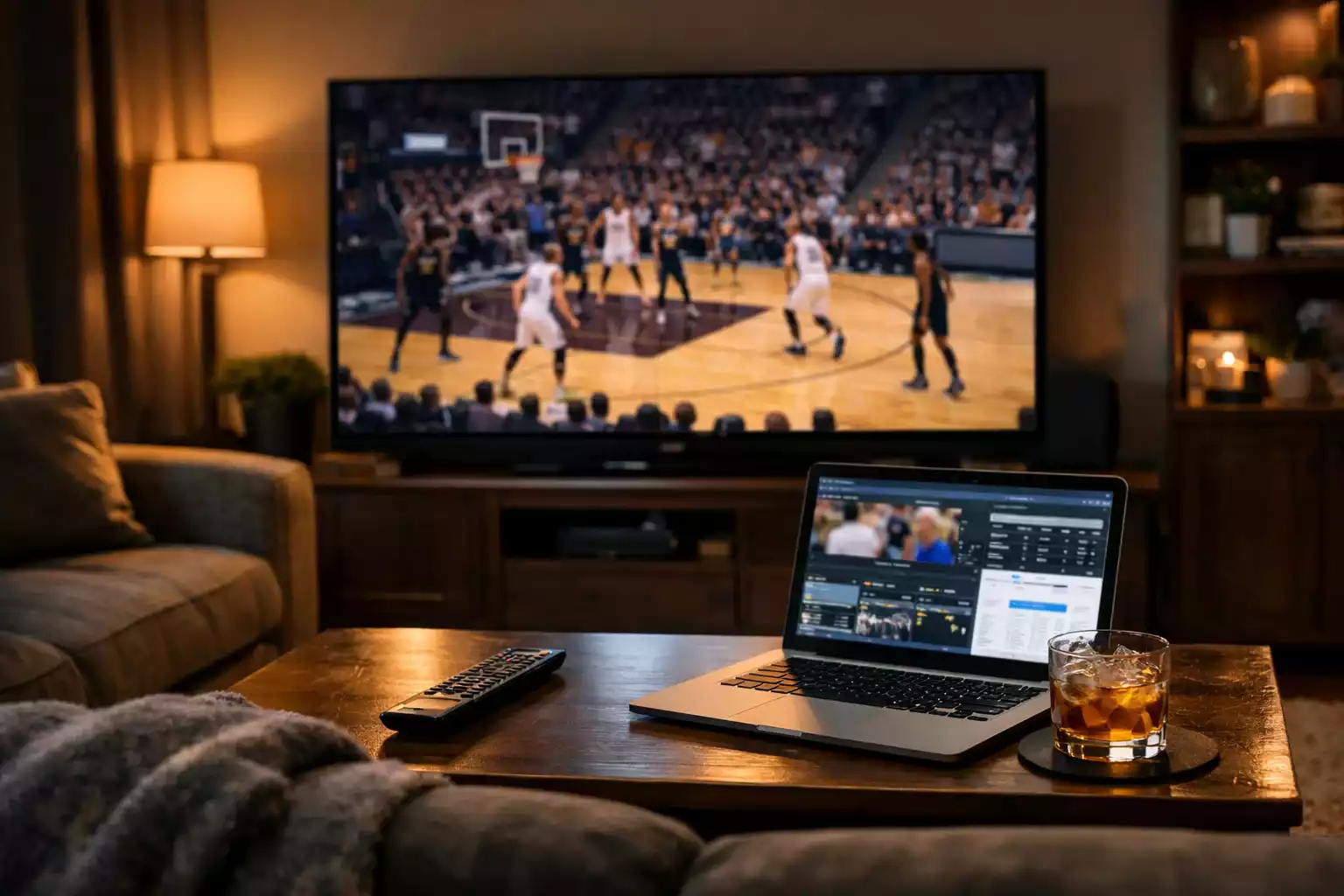 Thuissetup met twee schermen voor live basketbal kijken en wedden